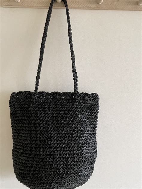 Bolso de rafia Negro .